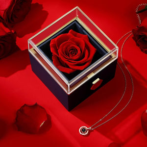 Rotating Natural Eternal Rose Jewelry Box With Necklace on table