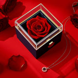 Rotating Natural Eternal Rose Jewelry Box With Necklace on table